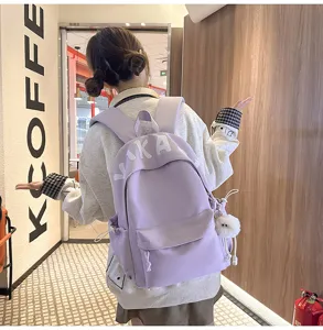 Light purple large capacity canvas backpack for school students and casual daily use.