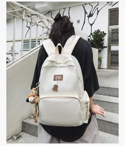 Campus style large capacity minimalist solid color student backpack detailed view showing design