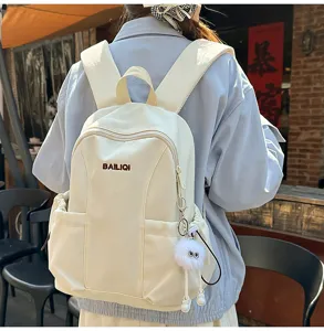 Lightweight waterproof casual backpack for women, large capacity travel school book bag.