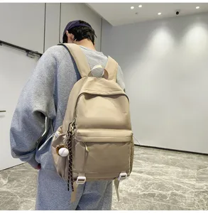 Casual minimalist large capacity solid color school backpack for men and women daily use