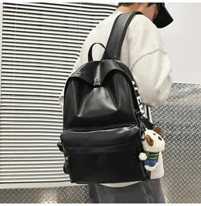 Stylish black PU leather backpack for women, waterproof school bag and casual daypack.