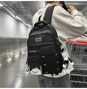 Large capacity black school backpack for students, lightweight durable daily casual bookbag.