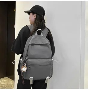 Grey canvas casual school backpack for students with large capacity and stylish daily design