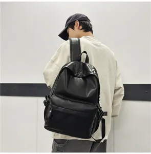 Men black PU leather backpack casual school bag stylish waterproof computer daypack for daily use.