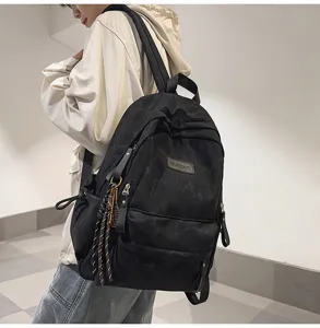 Japanese style campus minimalist large capacity black backpack for students and daily commute.