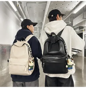 Waterproof PU leather backpack for women, stylish minimalist school bag for daily commute.