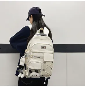 Large capacity student backpack with multi pockets, cute plush pendants, white aesthetic school bag.