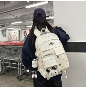 Large capacity school backpack for students, multi-pocket lightweight spine protection book bag.