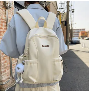 Lightweight travel backpack for women, waterproof large capacity school bag for daily commute and outdoor activities.