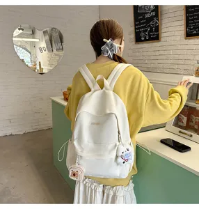 Casual Japanese style white school backpack detail shot, lightweight daily travel bag.