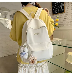 Casual nylon school backpack for women, daily travel lightweight daypack with cute charms.