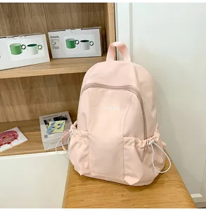Lightweight travel pink backpack large capacity school bag for daily commuting and student use