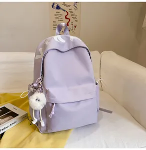 Detailed view of the stylish light purple backpack, minimalist design for students.