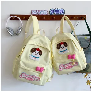 Cute Japanese ins style canvas school backpack for students, light yellow cute dog design.
