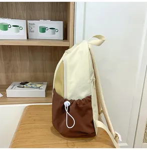 Casual canvas backpack for women and students, lightweight large capacity travel school bag.