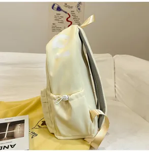 Minimalist yellow canvas backpack detail view large capacity school bag for daily use