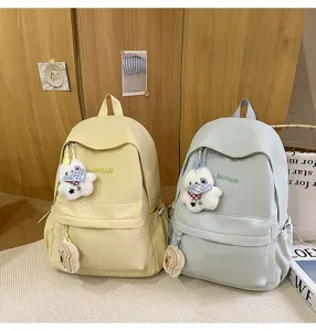 Japanese style ins casual campus backpack for girls, lightweight travel school bag for students.