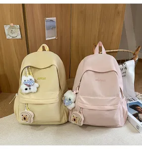 Japanese ins style casual school backpack for women, cute plush pendants, lightweight travel bag.