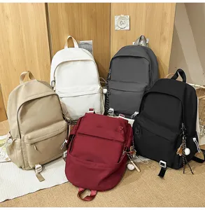 Detail view of the large capacity student backpack featuring multi-color solid design.