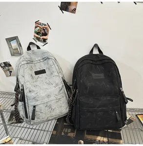 Campus style large capacity backpack for students, versatile canvas school bag with multi pockets.
