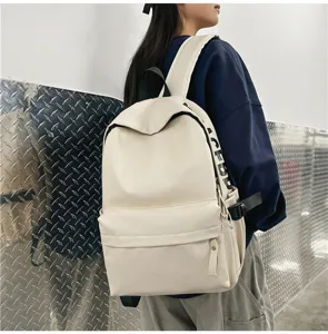 White PU leather backpack for women, casual soft waterproof school computer bag detail view.