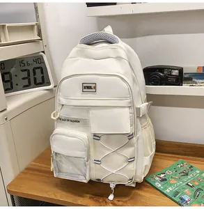 Large capacity student school bag white multi-pocket lightweight backpack for teens.