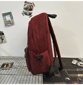 Japanese style campus simple casual backpack for students, large capacity side pocket design.