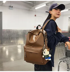 Brown PU leather waterproof laptop backpack for women daily use stylish detail view