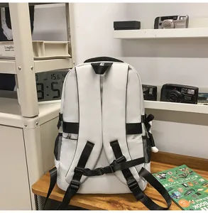 White casual backpack with black straps and buckles, detailed view of student school bag daily use.