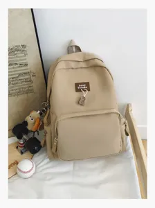 Casual khaki canvas backpack for students, large capacity daily school bookbag for teens.