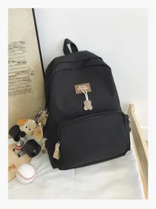 Black campus casual student backpack detail view, large capacity nylon book bag for daily use.