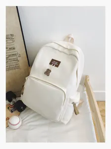 Solid color canvas campus backpack, large capacity student school bag, minimalist daily bookbag.