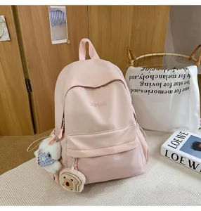 Pink casual campus school backpack for women, lightweight nylon backpack for daily travel and school.