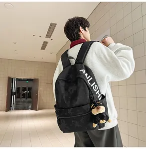 Stylish large capacity camouflage backpack for students, casual daily laptop school bag.
