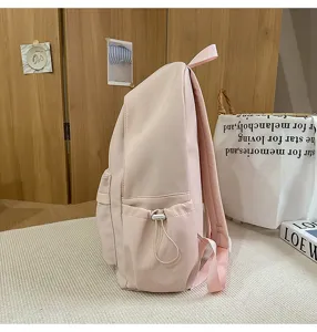 Casual pink campus backpack for women and students, lightweight daily travel school bag.