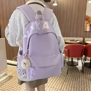 Light purple large capacity canvas backpack back view, simple daily casual school bag for girls.