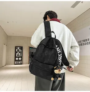 American vintage black backpack for students, large capacity casual campus school bag.