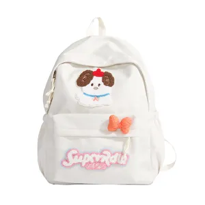 Cute Japanese style white canvas backpack with adorable dog patch and bow for school girls.