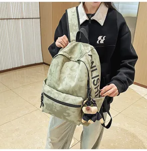 Vintage tie-dye canvas backpack for women students, large capacity casual daily school bag.