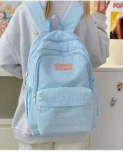 Light blue casual school backpack for students, lightweight nylon daily daypack with pockets