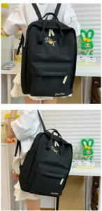 Black canvas backpack for women, Korean style casual school bookbag with front pocket.