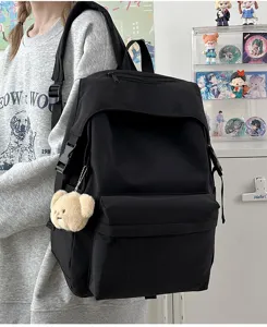 Japanese style solid color nylon backpack casual school bag for women and girls daily use.