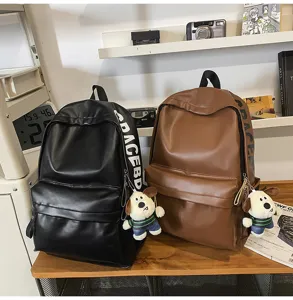 PU leather waterproof backpack for women, minimalist daily school bag with cute dog pendant.
