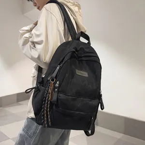 Japanese campus casual large capacity black backpack for students, versatile daily school bag.