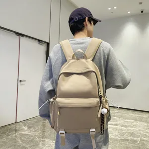 Casual solid color large capacity canvas school backpack for men and women daily travel bag