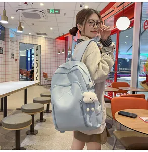 Cute Japanese school backpack for teen girls, large capacity canvas travel daypack style.