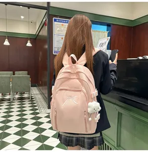 Cute Japanese school backpack for teen girls, large capacity casual travel daypack pink.