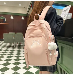 Japanese cute pink school backpack for girls, large capacity student casual travel daypack.