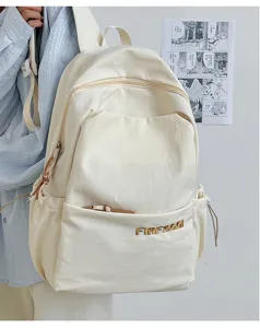 Minimalist large capacity canvas backpack casual daypack for daily commuting and school use.