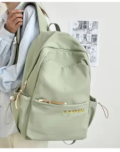 Casual light green canvas backpack for daily school travel with large capacity and multi pockets.